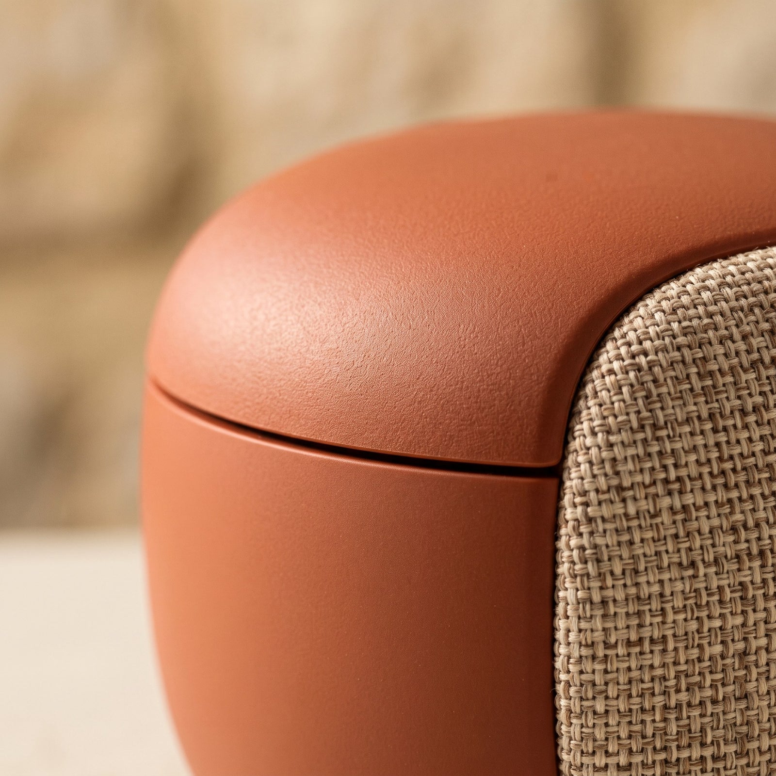 Macro detail of the Tondo's soft-touch shell and rounded rim